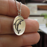 Sterling Silver Oval Dolphin Necklace